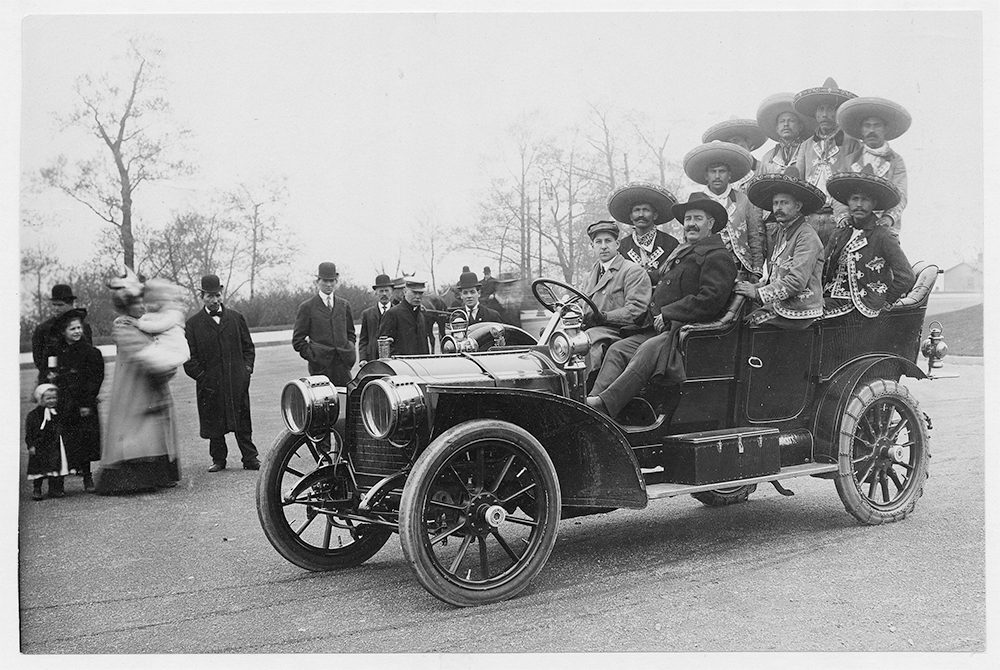 Buffalo Bill's Wild West cast members in an automobile.